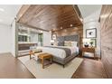 Luxurious main bedroom with wood accents, ensuite bathroom, and a spacious walk-in closet at 2105 Fairhaven Ne Cir, Atlanta, GA 30305