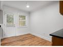 Bright dining area with new floors, direct access to the outside, and plenty of natural light at 149 Rondak Se Cir, Smyrna, GA 30080