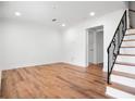 Bright living room featuring new floors, fresh paint, and ample space for relaxing or entertaining at 149 Rondak Se Cir, Smyrna, GA 30080