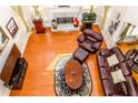 View from above showcasing the hardwood floors, large windows, fireplace, and high ceilings at 2905 Olde Town Park Dr, Norcross, GA 30071