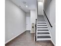 Bright entryway with hardwood floors and staircase at 711 Topsail Ln, Alpharetta, GA 30005