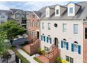 Elegant townhome with classic architecture, brick accents, and well-maintained landscaping at 6459 Chariot St # 35, Atlanta, GA 30328