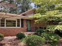 Charming brick home with well-maintained landscaping, enhancing its curb appeal at 3746 Gladney Dr, Atlanta, GA 30341