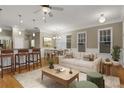 Bright living room with open floor plan with hardwood floors, modern decor, and stylish furnishings at 659 Holcomb Bridge Rd, Norcross, GA 30071