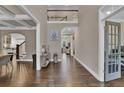 Spacious foyer featuring hardwood floors, high ceilings, and an open floor plan at 13015 Fox Rd, Alpharetta, GA 30005