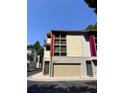 View of the townhome featuring a garage and abundant windows at 1400 Peter Haughton Nw Way, Atlanta, GA 30318