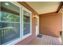 Cozy front porch area with wood floors and lots of sunlight at 104 Southfork Dr, Woodstock, GA 30189