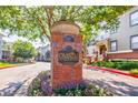 Community entrance sign amidst colorful flowers and lush greenery at 655 Mead Se St # 3, Atlanta, GA 30312