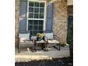 Inviting front porch sitting area, great for relaxing and enjoying the outdoors at 127 Spring Way Sq, Canton, GA 30114