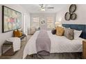 Spacious main bedroom features natural light, neutral color palette, and stylish decor at 1344 Riverstone Rd # 108, Jonesboro, GA 30238