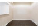 Clean and spacious empty room features hardwood floors and ample natural light at 3445 Stratford Ne Rd # 3403, Atlanta, GA 30326