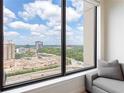 Gorgeous window view of the city and skyline from the comfort of the living room at 3445 Stratford Ne Rd # 2409, Atlanta, GA 30326