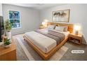 Cozy bedroom with a large window and modern furniture at 501 Vicksburg Pl, Atlanta, GA 30350