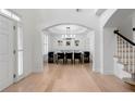 Bright dining room featuring hardwood floors and contemporary chandelier at 1691 Holcomb Lake Rd, Marietta, GA 30062