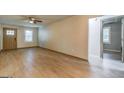 Spacious living room with modern flooring, neutral walls, and natural light is ready for your personal touches at 1024 Regis Rd, Atlanta, GA 30315