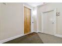 Hallway featuring unit entrance door and stairwell access at 898 Oak Sw St # 3228, Atlanta, GA 30310