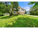 Exterior elevation displaying the side yard and entryway steps to the home at 2706 Del Ridge Dr, Douglasville, GA 30135