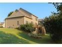 Spacious backyard with a multi-tiered deck at 730 Midway Ave, Canton, GA 30114