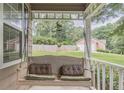 Cozy porch swing, a perfect spot to unwind and enjoy the view at 4411 Westerling Ct, Powder Springs, GA 30127