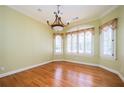 Light-filled dining room with hardwood floors and large windows providing ample natural light at 1006 Arbor Ne Trce, Atlanta, GA 30319