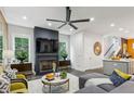 Bright living room featuring a fireplace and open layout at 1821 Huntington Hills Nw Ln, Atlanta, GA 30309