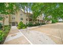 Exterior view of building with parking, sidewalk, and surrounding trees and shrubs at 3655 Habersham Road Northeast Ne Rd # B249, Atlanta, GA 30305
