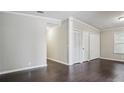 Inviting living room with dark wood floors and fresh neutral paint at 1696 Thomas St, Decatur, GA 30032