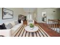 Bright living room with stylish decor, hardwood floors, and ample natural light, creating a warm and welcoming atmosphere at 1060 Heatherwood Ct, Norcross, GA 30093