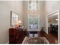 Elegant foyer with hardwood floors, chandelier, and tall ceilings at 1020 Matheson Way, Johns Creek, GA 30022