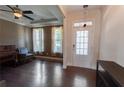 Inviting living room with hardwood floors, neutral walls, and a light-filled entryway at 2600 Arnold Palmer Way, Duluth, GA 30096