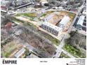 Wide aerial shot showing new construction development with modern townhomes in a neighborhood setting at 921 Hughley Circle Se # 66, Atlanta, GA 30316