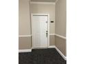 Apartment door with security features and a modern design at 1955 Nocturne Dr # 3105, Alpharetta, GA 30009