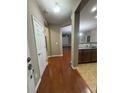 Inviting entryway with hardwood floors leading to the living spaces at 1955 Nocturne Dr # 3105, Alpharetta, GA 30009