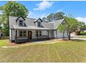 Beautiful two-story home with a classic design and well-maintained lawn at 2979 Overwood Sw Ln, Snellville, GA 30078