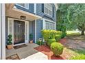 Inviting front door entrance with meticulously maintained landscaping and elegant details creating a welcoming curb appeal at 254 Wood Duck Dr, Jonesboro, GA 30238