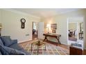 Cozy living room featuring hardwood floors and an open doorway at 340 Channings Lake Dr, Lawrenceville, GA 30043