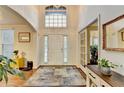 Inviting foyer with hardwood floors, high ceilings, and ample natural light at 350 River Walk Ter, Johns Creek, GA 30024