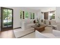 Bright and airy living room featuring a comfortable couch and natural light at 118 Chelsea Dr, Decatur, GA 30030
