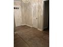Inviting foyer with stylish brick flooring at 276 Colewood Nw Way, Atlanta, GA 30328