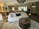 Comfortable living room with neutral tones and ample natural light at 276 Colewood Nw Way, Atlanta, GA 30328