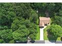 Aerial view showcases this single-Gathering home nestled among lush greenery and a private backyard at 106 Kimbell Farm Dr, Locust Grove, GA 30248