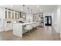 Spacious kitchen with large island, quartz countertop, modern stainless steel appliances, and ample cabinet space at 474 Haley Se St, Marietta, GA 30060