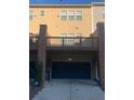 A spacious garage with an ADT security sign and back porch at 1749 Breyerton Ne Dr, Atlanta, GA 30329