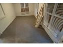 Cozy living room featuring neutral carpet, bright windows, and neutral walls at 2083 Meador Se Ave, Atlanta, GA 30315