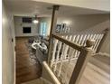 Spacious basement featuring a cozy fireplace, comfortable seating, and stylish decor at 4550 Cypress Ridge Ct, Stone Mountain, GA 30083