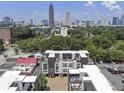 Townhomes with rooftop decks in an urban neighborhood with the city skyline at 131 City View Ne Ct, Atlanta, GA 30308