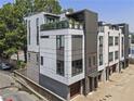 Side view of a new construction townhome with gray and white color scheme at 131 City View Ne Ct, Atlanta, GA 30308