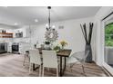 Dining area with modern decor, neutral colors, wood floors and access to outdoors at 2550 Laurel Ridge Dr, Decatur, GA 30033
