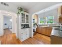 Well-lit kitchen with stainless steel appliances, granite countertops, and hardwood floors at 830 Barnett Ne St # 2, Atlanta, GA 30306