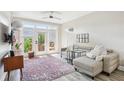 Cozy living room with lots of natural light and french doors leading to a small patio at 840 United Se Ave # 205, Atlanta, GA 30312